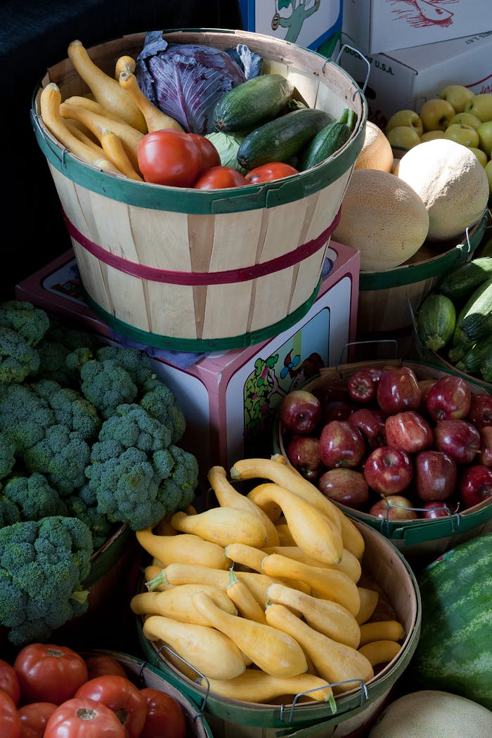 stats-img A vibrant display of fresh vegetables and fruits in baskets at a local market, showcasing healthy options.